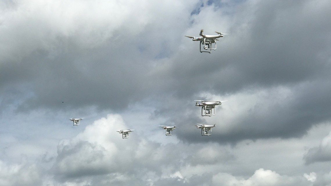 custom built drones in flight