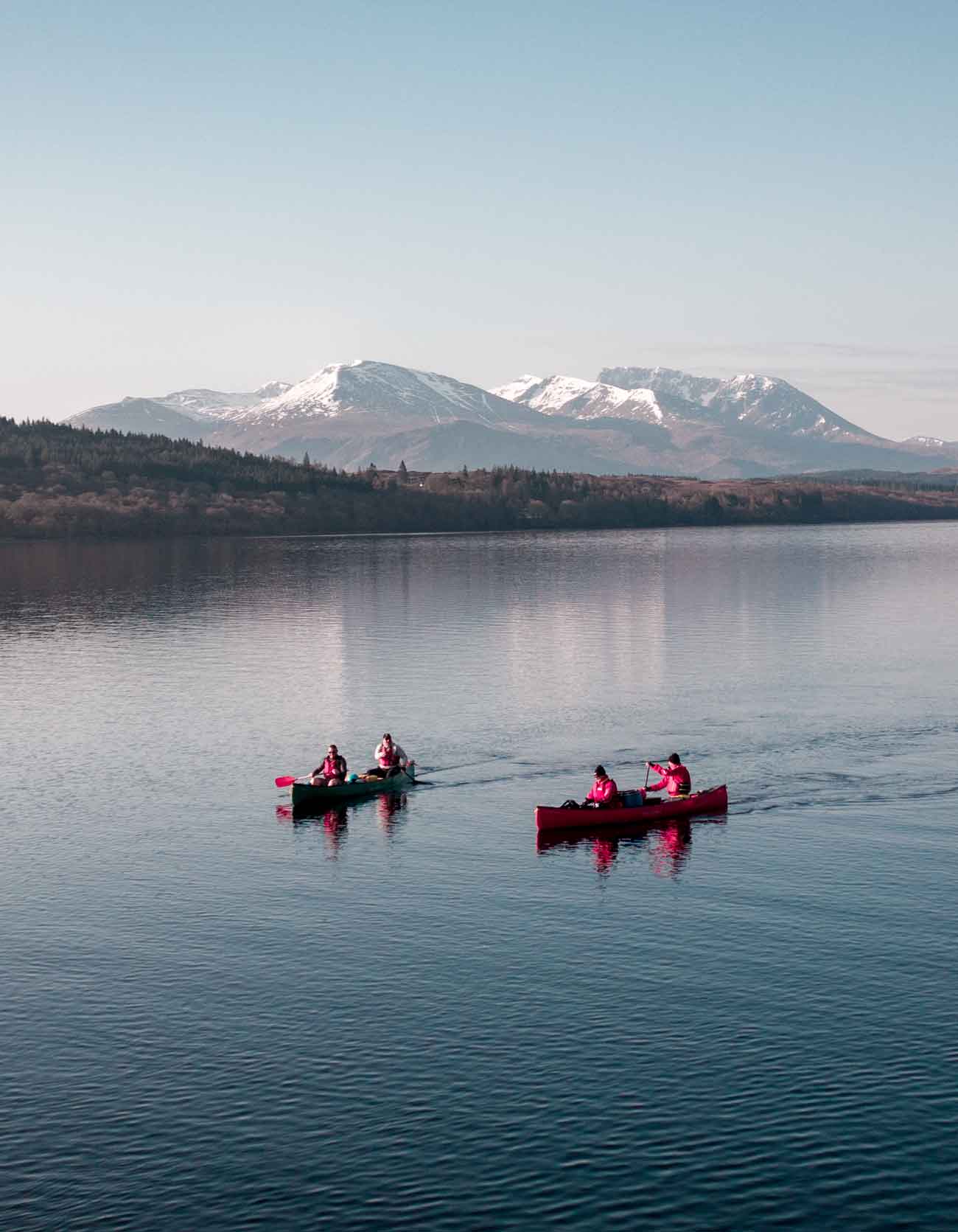 canoeists adventuring drone photograph