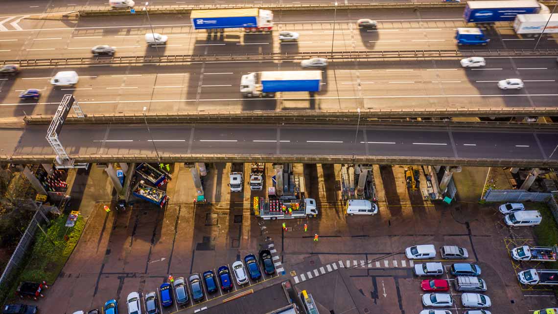 motorway depot under a bridge drone photo