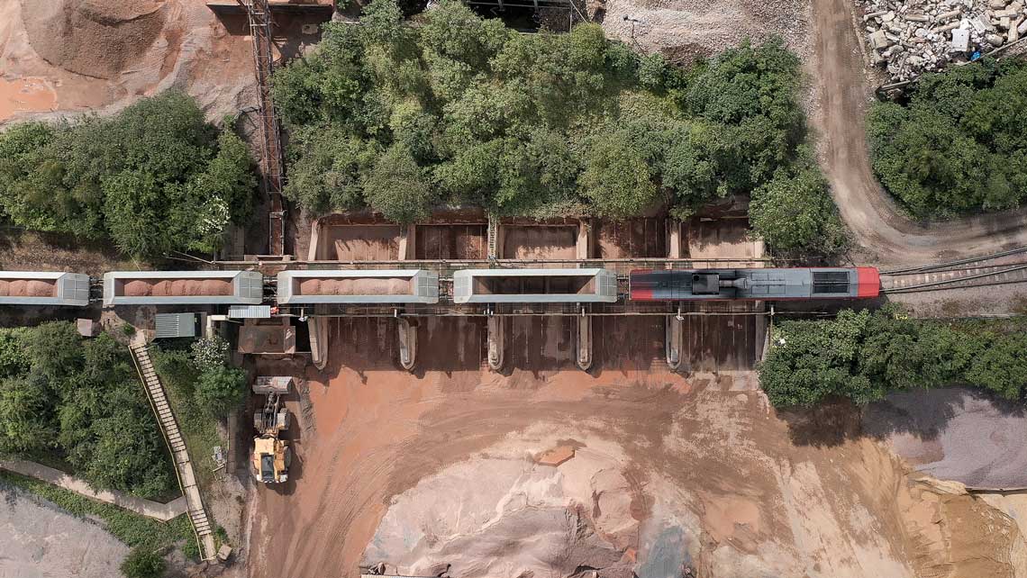 Aerial drone shot of freight train construction project